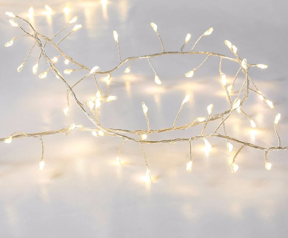 Stringa di 50 Luci LED a Grappolo di Filo d'argento Bianco Caldo IP44